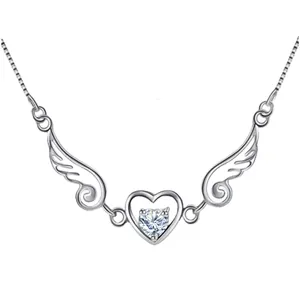 Close-up of heart-shaped pendant with angel wings and central cubic zirconia stone