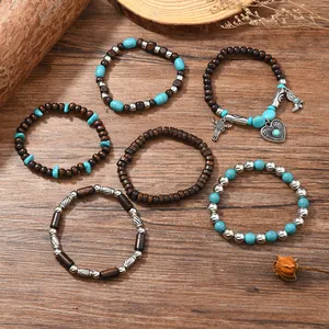 Exquisite vintage bohemian style bracelet set featuring wooden beads and turquoise accents
