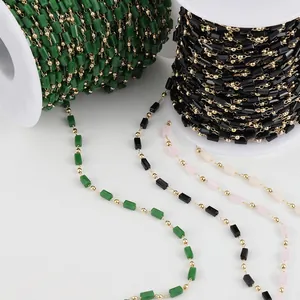 Macro view of 14K gold-filled jewelry chain with crystal square beads for DIY