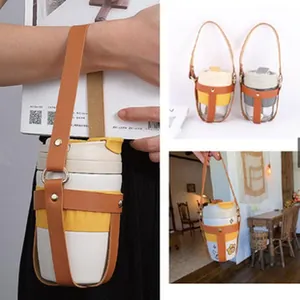 Detail showing a portable PU leather cup carrier sleeve with a detachable strap