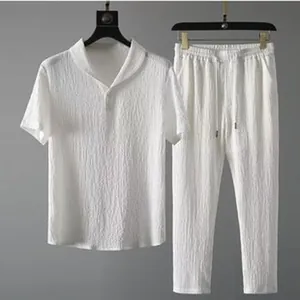 White men's linen-textured short-sleeved shirt and casual pants two-piece set.