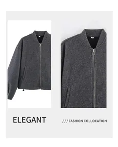 Detailed view of gray textured women's casual jacket with silver zipper closure