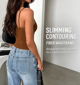Detailed side view of a slim fit brown camisole bodysuit paired with light blue denim jeans