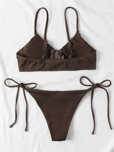 Detail view of chocolate brown rib-knit triangle bikini set with side-tie bottoms