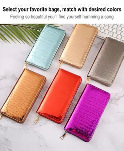 Detail view of women's long wallets with embossed stone pattern in various vibrant colors