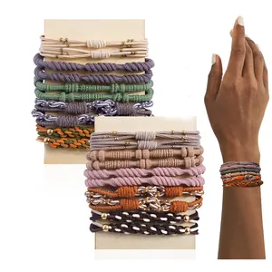 Detailed view of bohemian handmade elastic hair ties worn as stylish vintage bracelets