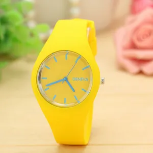 Detailed macro view of a vibrant yellow silicone Geneva watch with minimalist blue dial