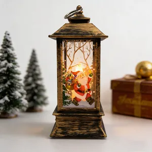 Detailed view of vintage gold Christmas lantern with LED candle and Santa