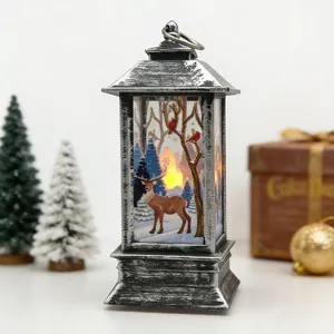 Close-up of vintage silver Christmas lantern with reindeer forest design and LED light