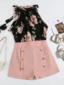 Summer casual sleeveless floral halter top and high-waist pink shorts two-piece outfit