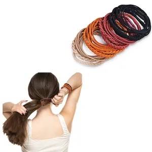 Detail showing multi-colored handmade bohemian hair ties used as a ponytail holder