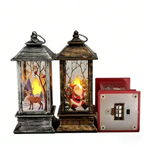 Detail view of Christmas LED lanterns showing Santa, reindeer and battery compartment