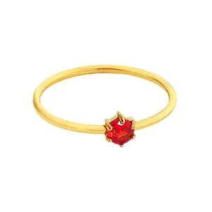 Elegant gold stainless steel ring with a vibrant round red zircon and six-prong setting.