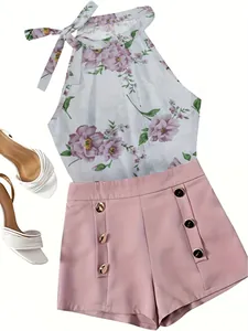 Stylish women's summer 2-piece outfit with floral halter top and pink button shorts.
