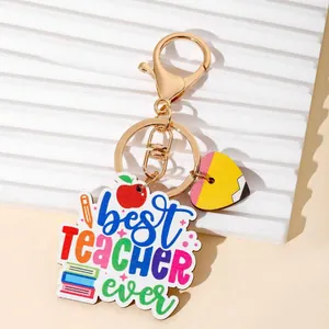 Colorful 'Best Teacher Ever' keychain with apple and book icons and gold clasp.