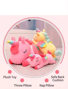 Close-up detail of soft pink and yellow unicorn plushies for home decor and kids' rooms.
