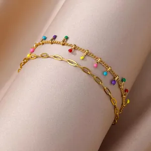Detailed view of a gold-plated double-layer stainless steel anklet with colorful beads