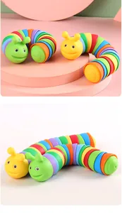 Detailed macro view of vibrant rainbow caterpillar slug fidget toy with colorful flexible segments.