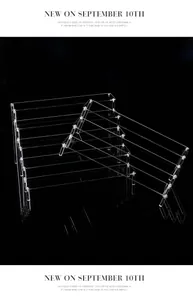Side view of a 4-tier clear acrylic display stand for action figures and collectibles.