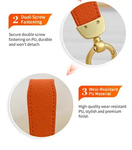 Detailed view of durable orange PU leather keychain with gold double screw fastening