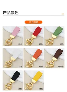 Grid view of various goat grain leather keychains in eight stylish colors with gold rings