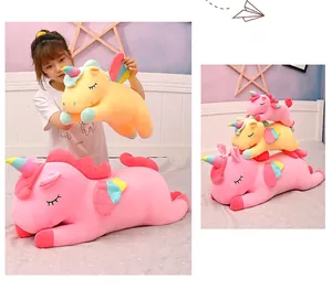 Detailed view of rainbow unicorn plush toys in various sizes and colors.