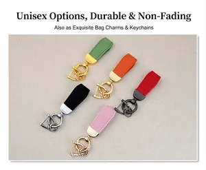 Macro view of five colorful textured leather keychains with premium metal hardware clips