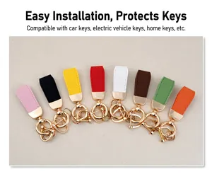 Detailed view of goat grain leather keychains in multiple vibrant colors with gold rings