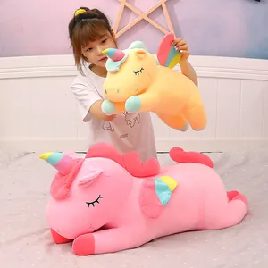 Cute pink and yellow unicorn plush toys with rainbow wings for girls birthday gift