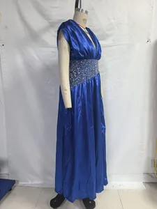 Detailed side view of a blue satin evening gown with sequined waist on a mannequin