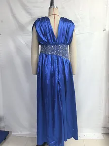 Back view of royal blue satin evening gown with sequined waist on mannequin