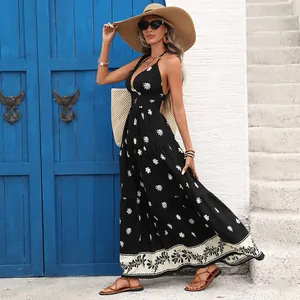 Elegant summer vacation vintage halter backless floral maxi dress with a flowy wide hem