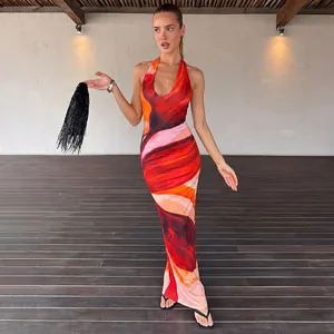 Elegant summer halter maxi dress featuring a sexy backless design and vibrant marble print.
