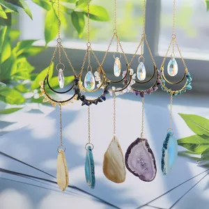 Handmade set of crystal moon suncatchers featuring natural agate slices and sun prisms