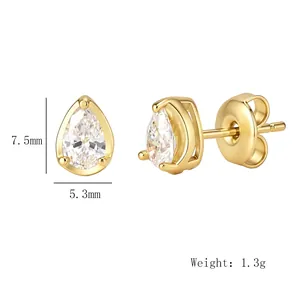 Detailed view of gold teardrop zircon earrings with 7.5mm by 5.3mm dimensions and weight
