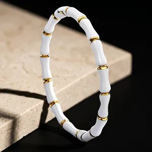 White and gold titanium steel bamboo joint bracelet with premium polished finish