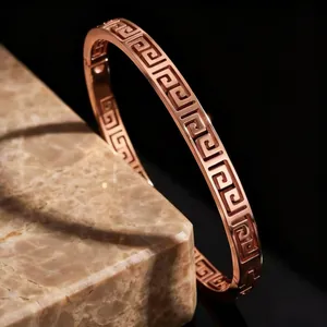 Elegant rose gold titanium steel bangle with vintage Greek key pattern design for women