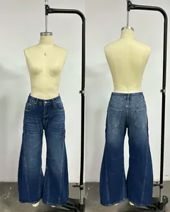 Front and back view of vintage high-waisted wide-leg denim jeans on a mannequin.