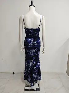 Back view of a sexy blue and white floral mesh mermaid dress shown on a mannequin