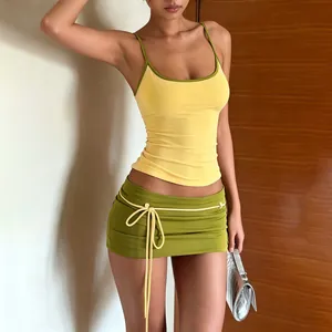 Ensemble sexy caraco jaune et mini-jupe vert olive deux pièces