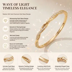 Close-up details of 18K gold plated pavé wave bangle with secure hinged clasp mechanism.