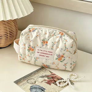 Aesthetic cream quilted floral makeup bag with large capacity and portable handheld handle