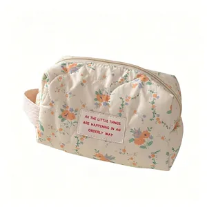 Large capacity cream floral quilted cosmetic bag with portable handle for daily storage