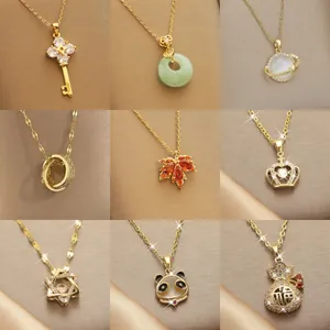 Collection of nine elegant gold-plated pendant necklaces with various minimalist designs