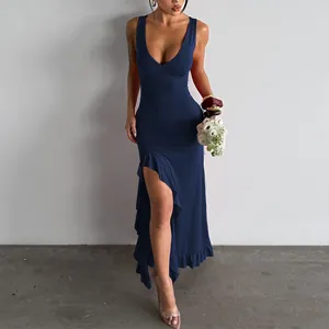 Elegant navy blue V-neck bodycon maxi dress with ruffled hem and high side slit detail.