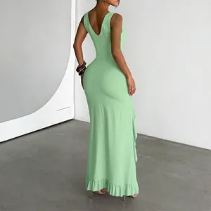 Back view of sexy mint green V-neck maxi dress with ruffled hem and side slit detail