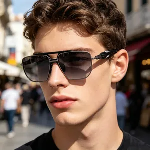 Detailed view of premium square men's sunglasses on a model with street background.