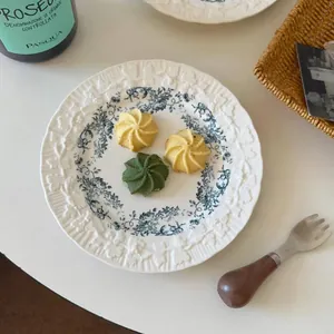 Vintage style ceramic plate with blue camellia floral pattern for afternoon tea