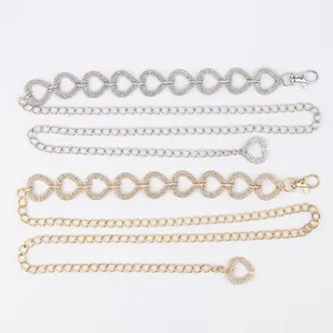 Close-up detail showing silver and gold heart rhinestone embellished waist chains