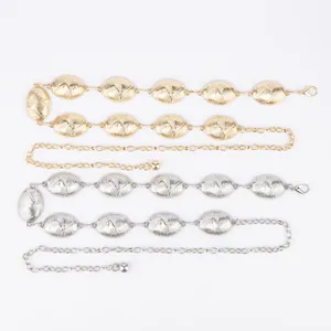 Detail showing gold and silver vintage bohemian metal waist chains for dresses